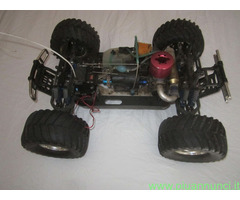 AUTO  A SCOPPIO TELECOMANDATA 4 WD TRUCK-MOSTER XT